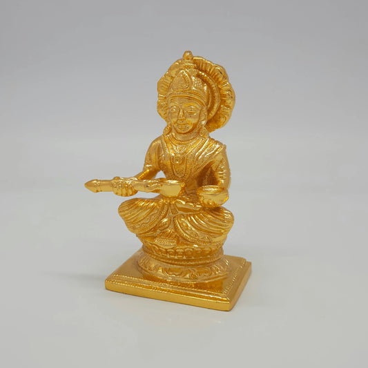 Premium Brass Goddess Annapoorani statue 5-inch 12cm 45-degree front left corner view highlighting clean detailed ladle handle and pot