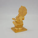 Premium Brass Goddess Annapoorani statue 5-inch 7.5 cm left back length view showing reverse of the crown and fluted sirachakra halo disc