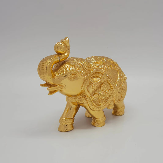 Premium Brass Gaja elephant statue raised trunk 17cm 45 degree left side angle view showing chiseled rosette royal saddle