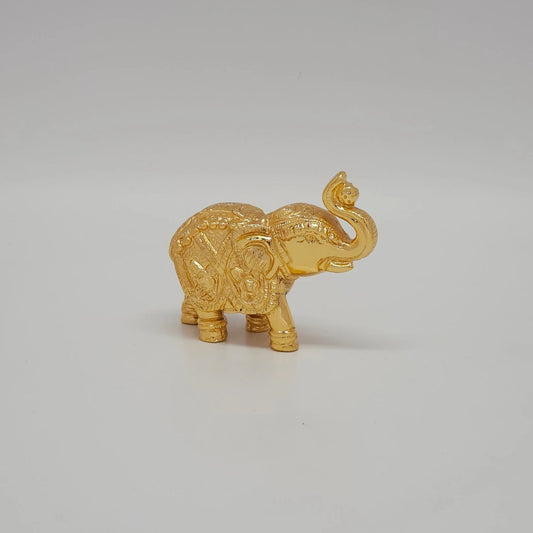 Premium Brass Gaja elephant statue raised trunk 9cm length front straight view showing detailed tusks and head adornments