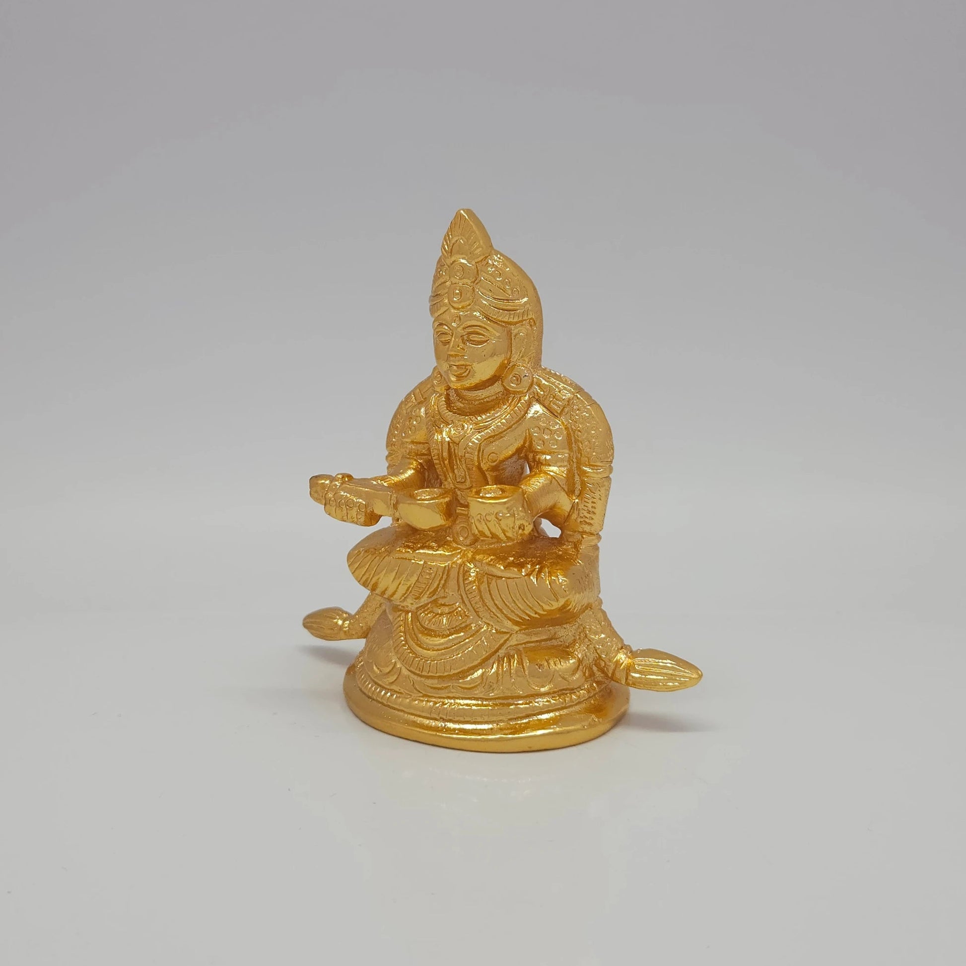 Premium Brass Goddess Annapoorani seated idol 3 inch 8.5cm height 45-degree front left view showing vessel pot detail extended peedam and sirachakra halo