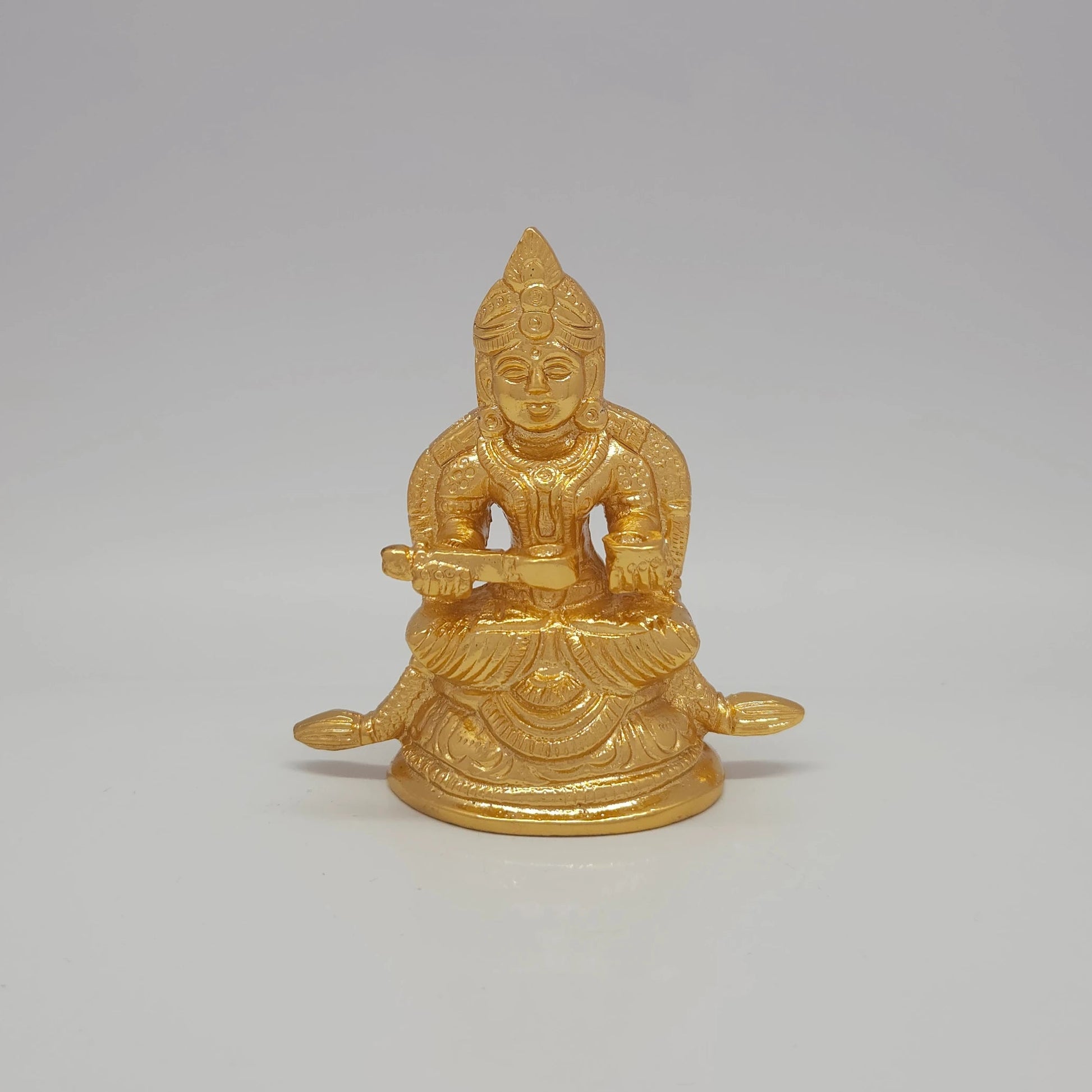 Premium Brass Goddess Annapoorani seated idol 3 inch 8.5cm height front view with ladle vessel flowing garland and sirachakra halo extended peedam