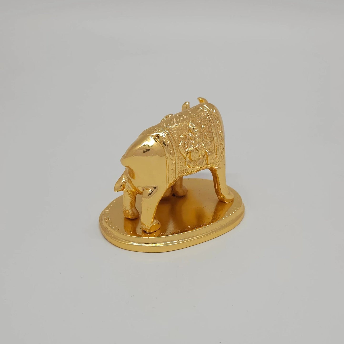 Premium Brass Kamadhenu cow and calf statue 8cm 45 degree rear left side angle view showing nursing calf details