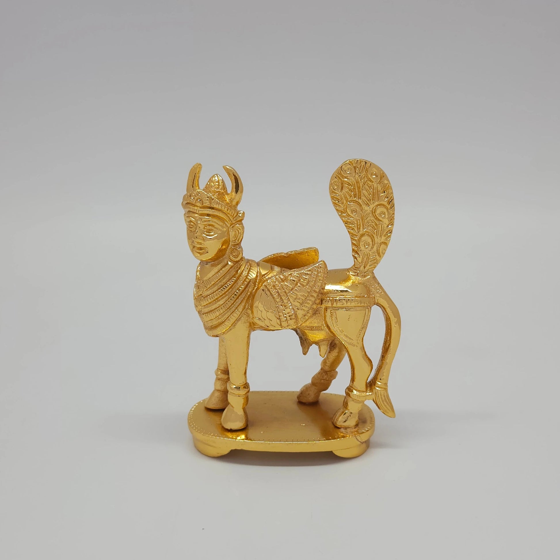 Premium Brass Kamadhenu cow statue wish fulfilling 4.3inch front straight view showing goddess face and crown