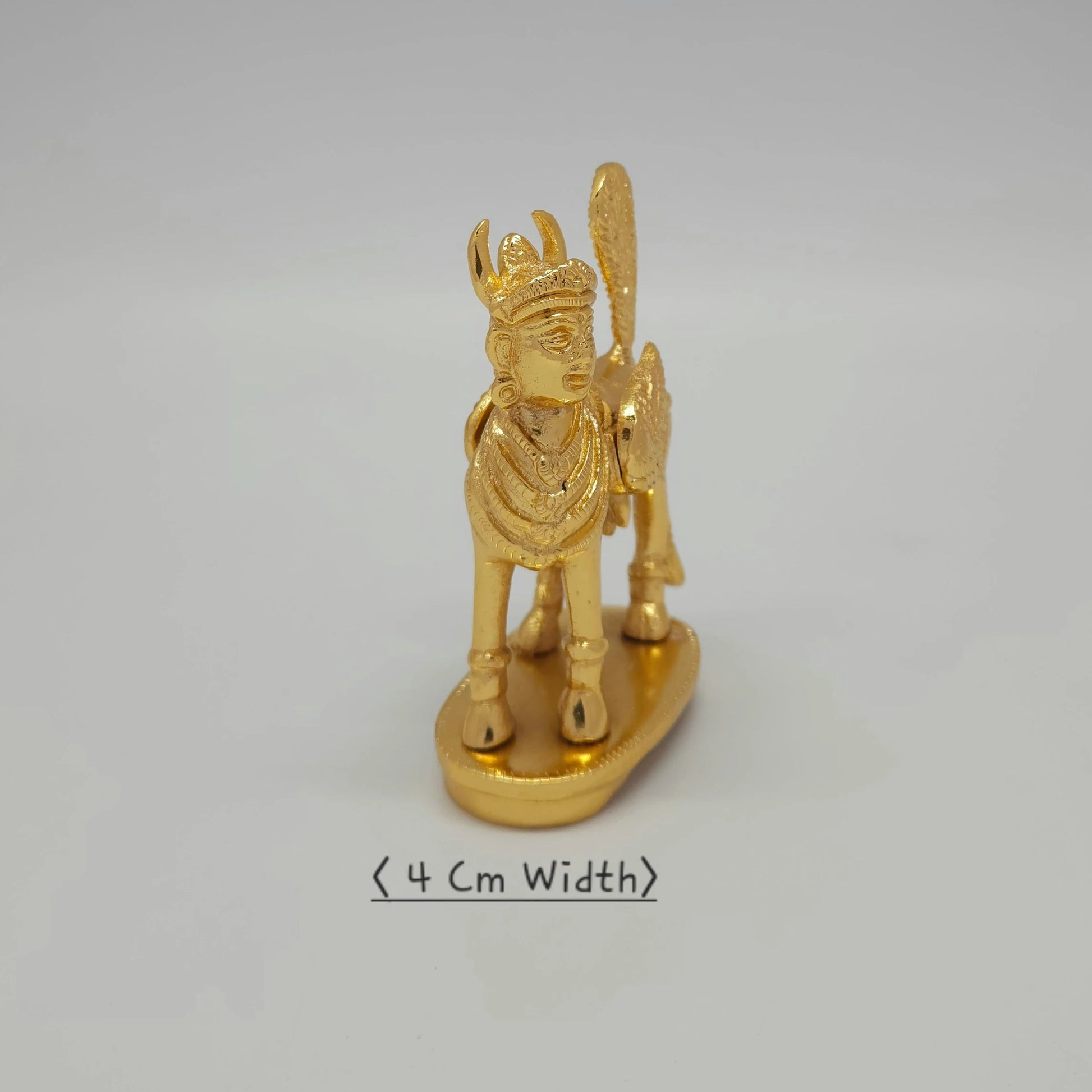Premium Brass Kamadhenu cow statue facing right side angle view showing ornated jewel works 4cm depth