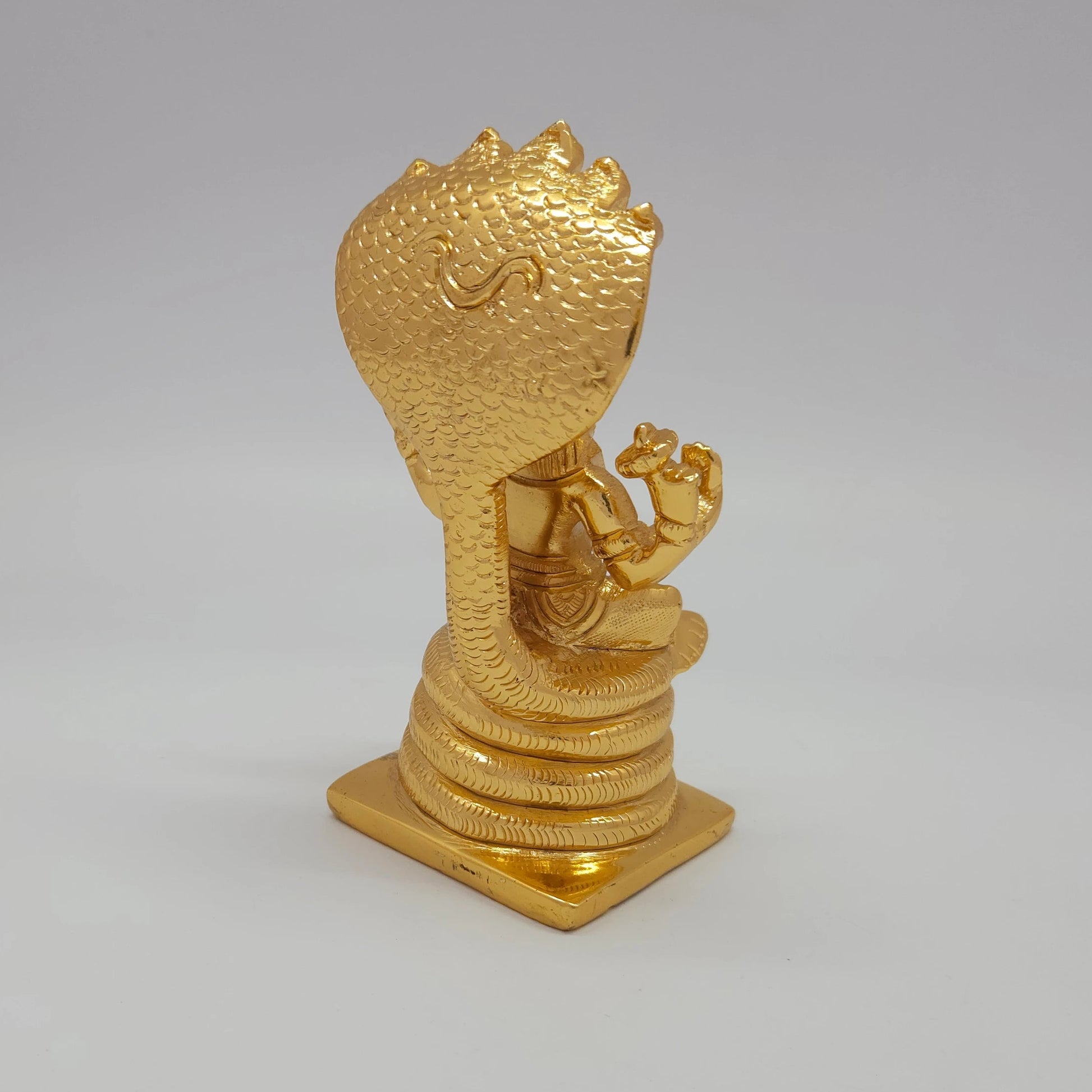 Premium Brass Lakshmi Narasimha statue 5 inch 13cm 45-degree rear right corner view focusing on seated Adishesha back portion
