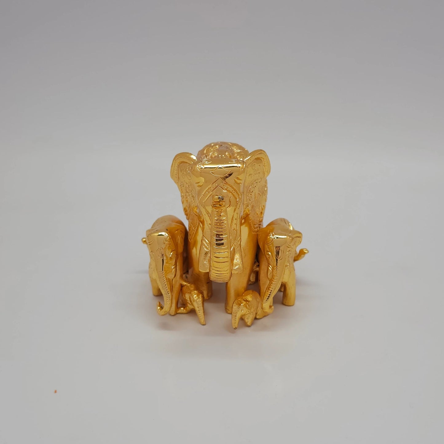 premium brass elephant statue with calves front straight detailed pose 