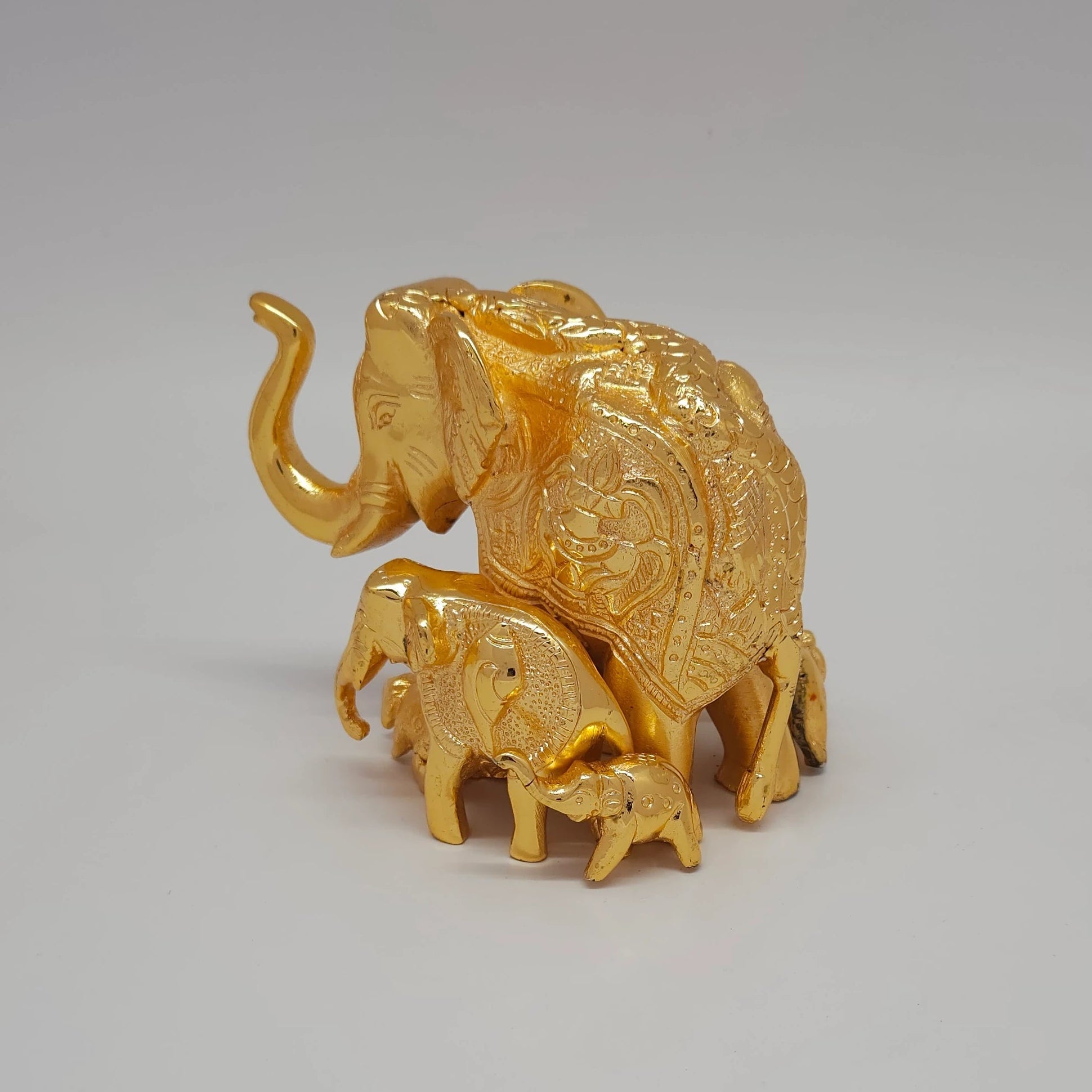 remium Brass family elephant statue 12cm 45 degree front left corner perspective showing baby elephant details