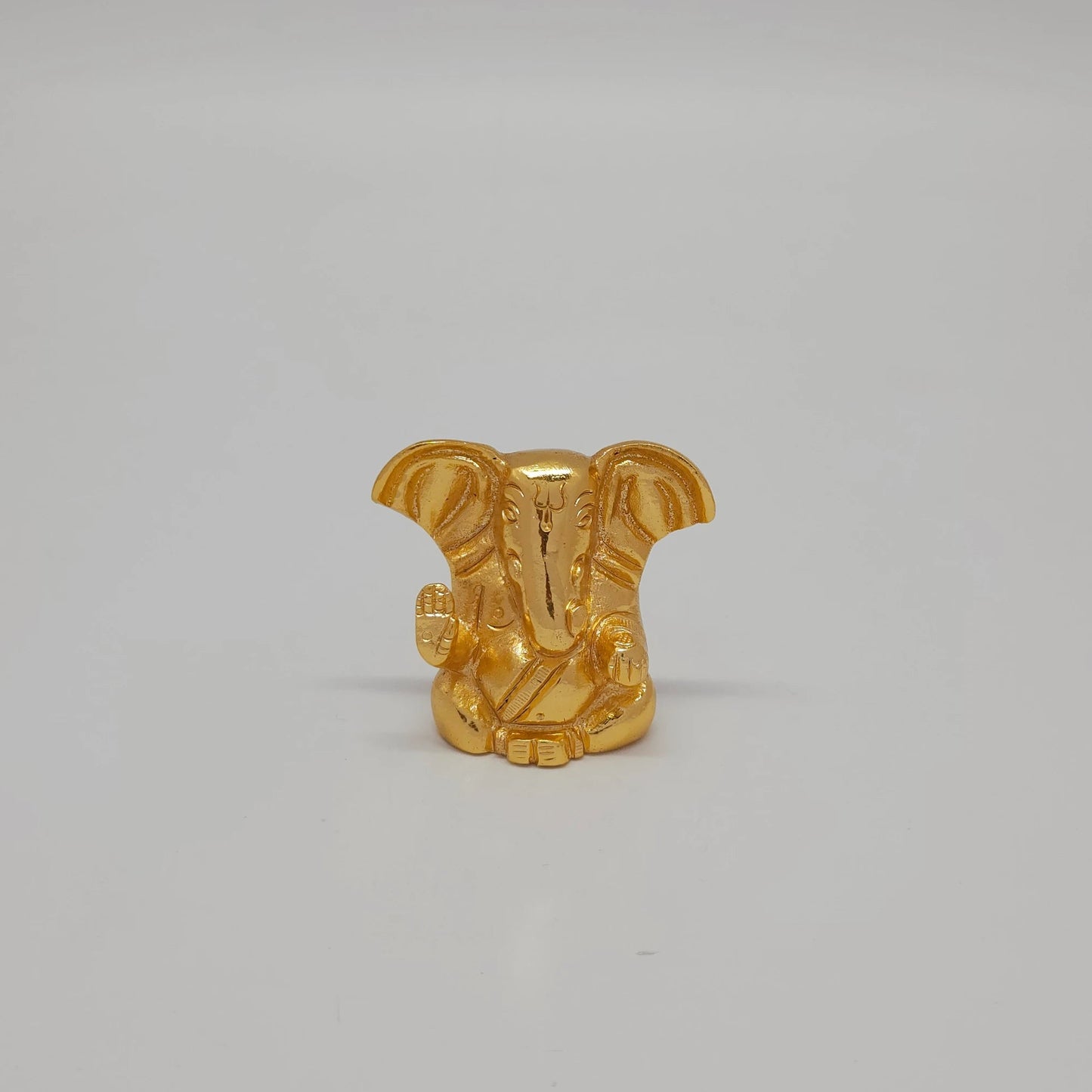 Premium brass miniature return gift  Ganesha abstract murti 4cm height 5cm length 2cm depth front view