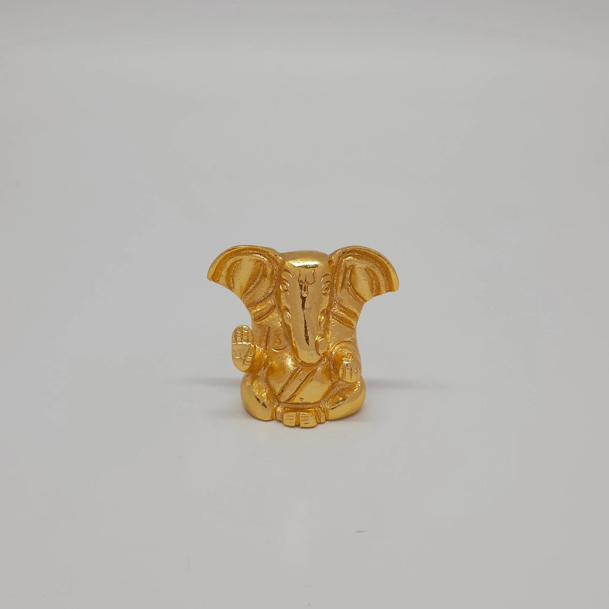 Premium brass miniature return gift  Ganesha abstract murti 4cm height 5cm length 2cm depth front view