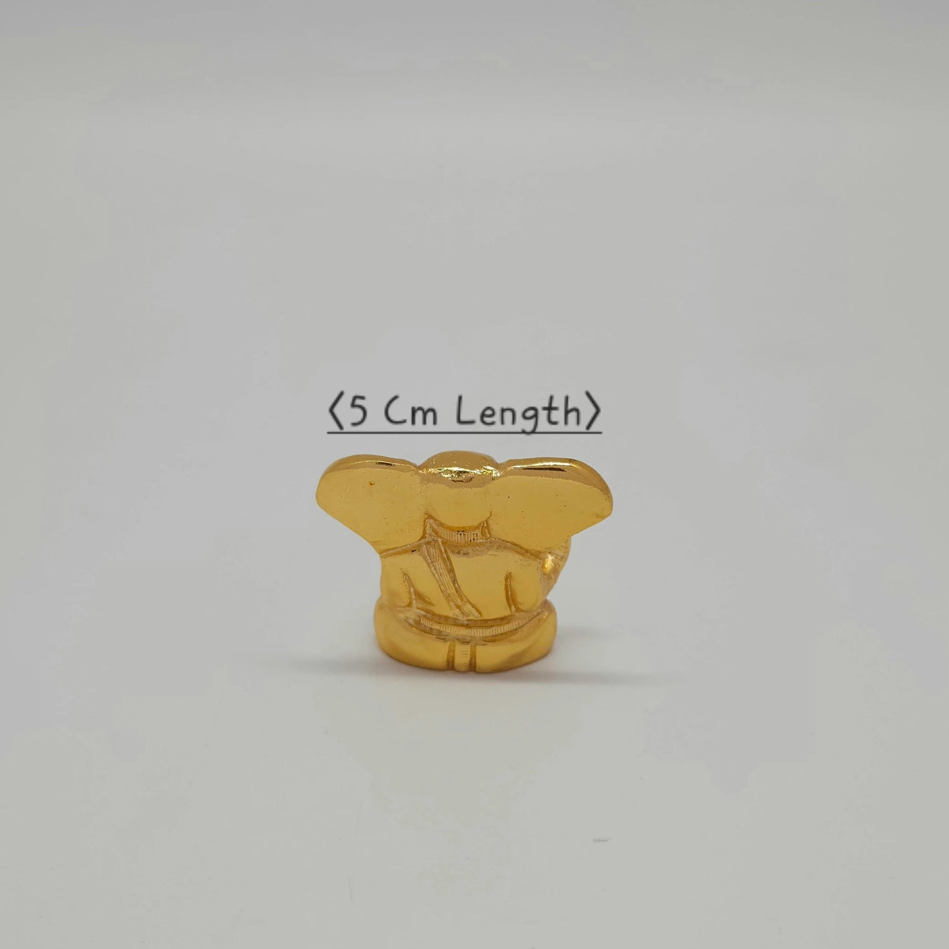 Premium brass miniature ganesha abstract murti 5cm length bottom view showing traditional hollow base casting