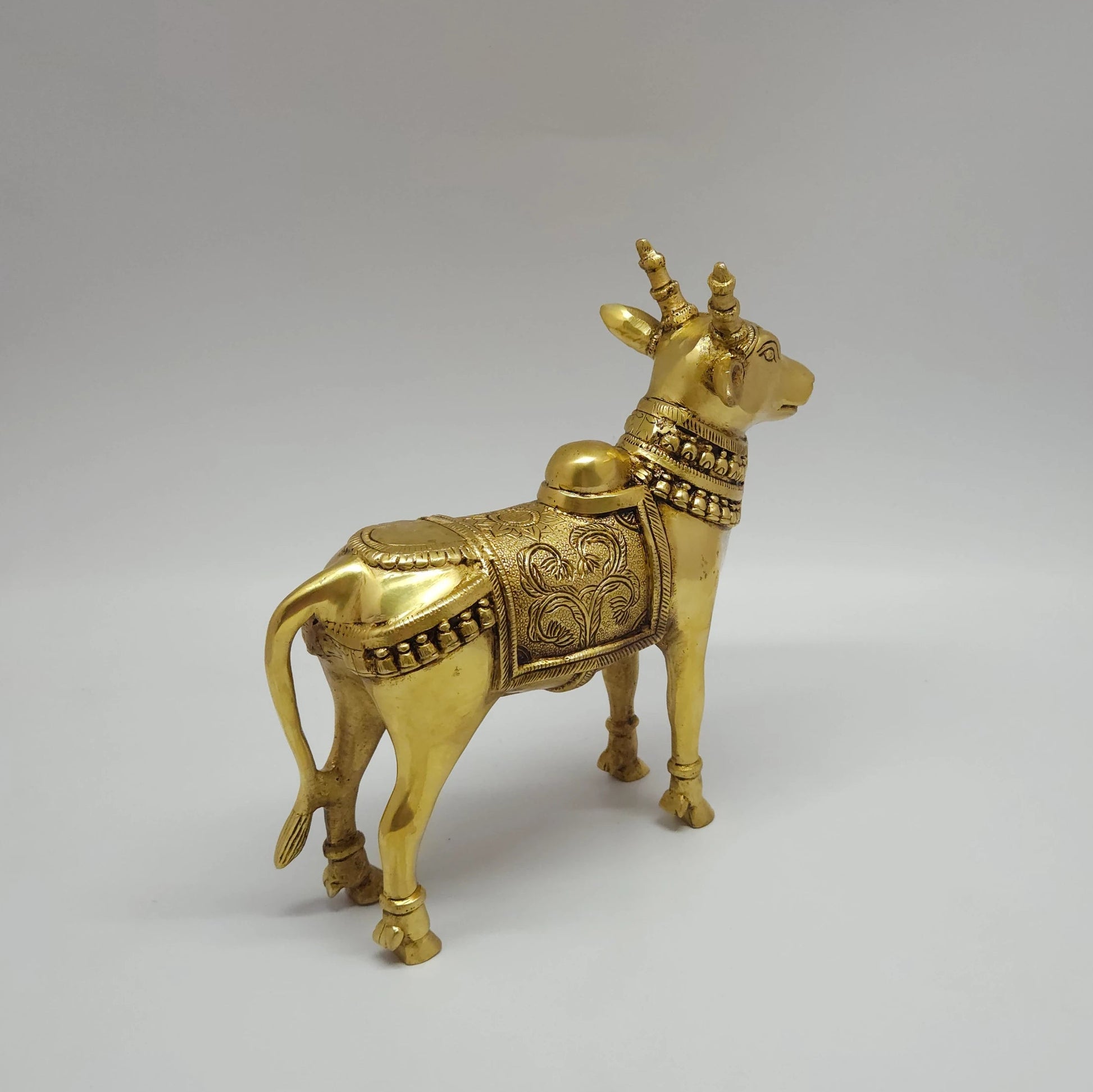  Premium Brass Nandi Statue sacred bull 22cm back view showing saddle details and metal casting structure