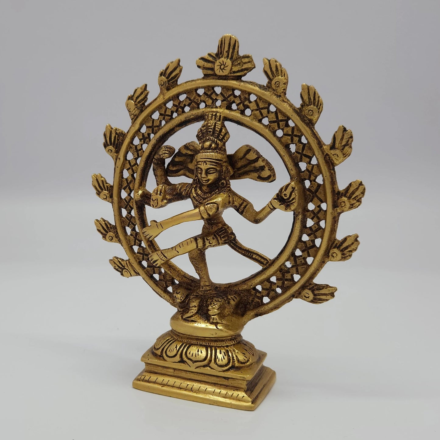 Premium Brass Lord Nataraja statue 6 inch 15cm 45 degree front right corner view focusing on agni flame hand and lotus base contours