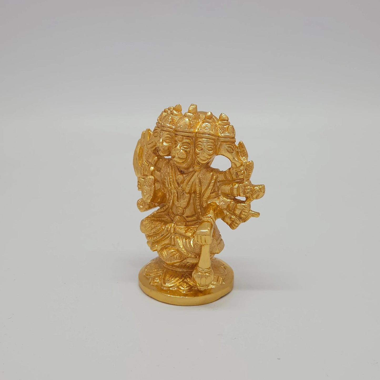 Premium Brass Panchamukha Hanuman statue multi size options 7cm and 9.5cm 45 degree front right corner view focusing on propped gada mace detail