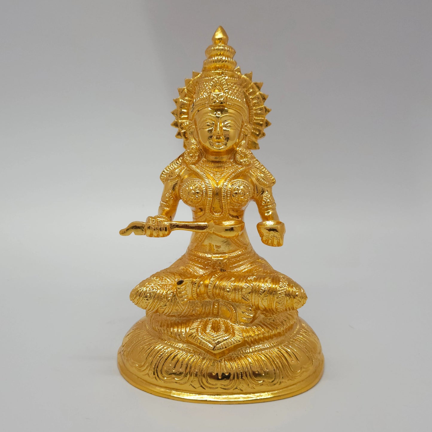 Premium pure brass seated Goddess Annapoorani statue with ladle anna karandi gold finish 7 inch 19cm height 12cm length 8cm depth 1.6kg weight straight pose front view decor full detailed view