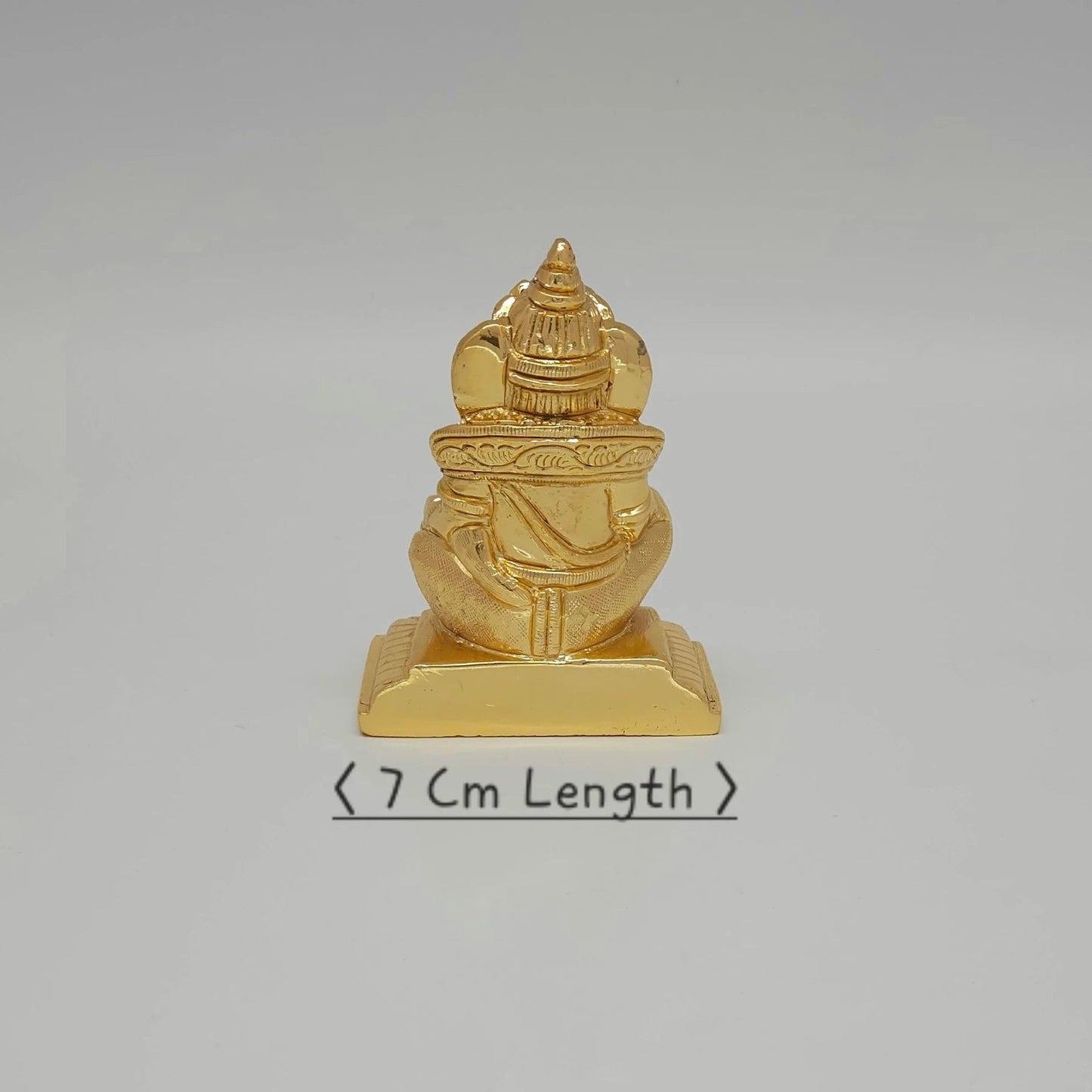 Premium Brass seated Lord Kubera statue 9.5cm back view showing detailed crown and halo metal casting symmetry