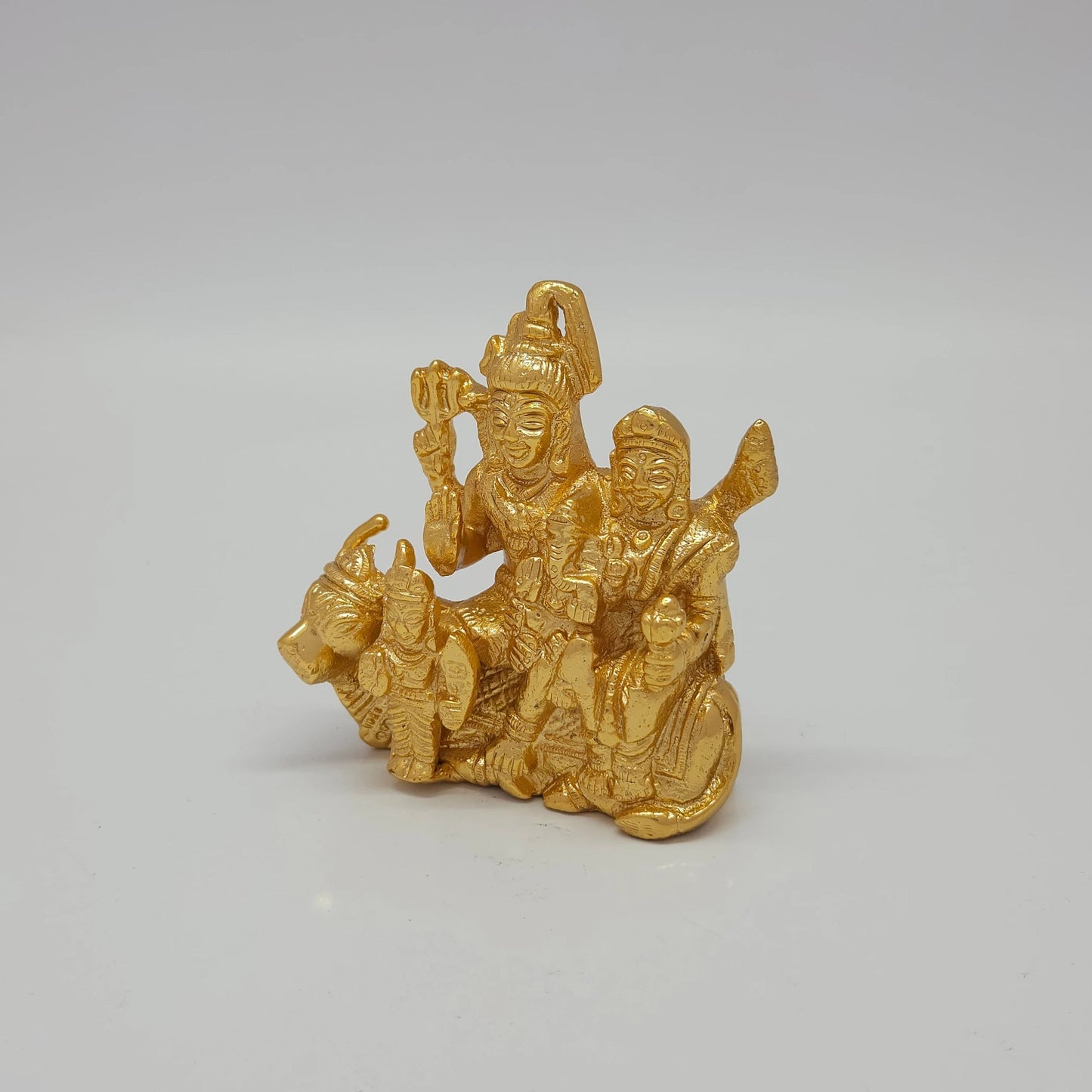 Premium Brass Shiva Parivar family statue 4 inch 9.5cm 45 degree front right corner view focusing on goddess parvati and seated nandi bull