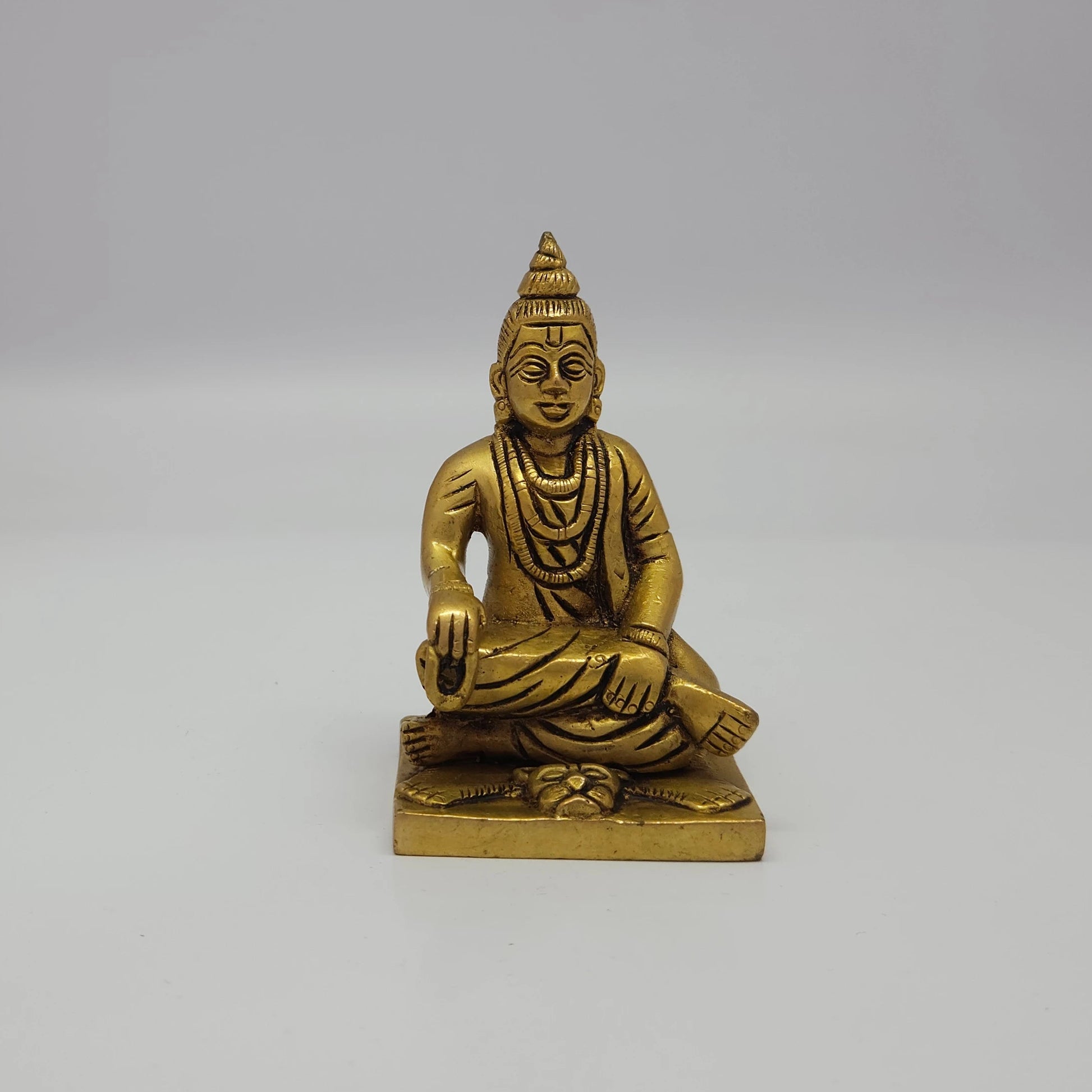 Premium Brass seated Sripada Srivallabha statue with traditional yoga danda 4-inch 10cm height 6cm length 5cm depth front profile size guide