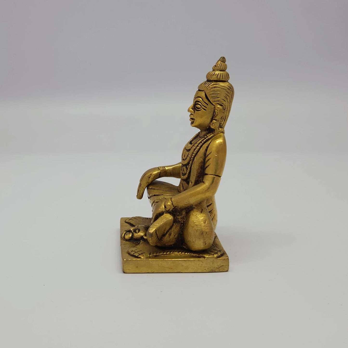 Premium Brass seated Sripada Srivallabha statue 4-inch 10cm high angle overview showing head crown structure tiger skin and leg alignment layout
