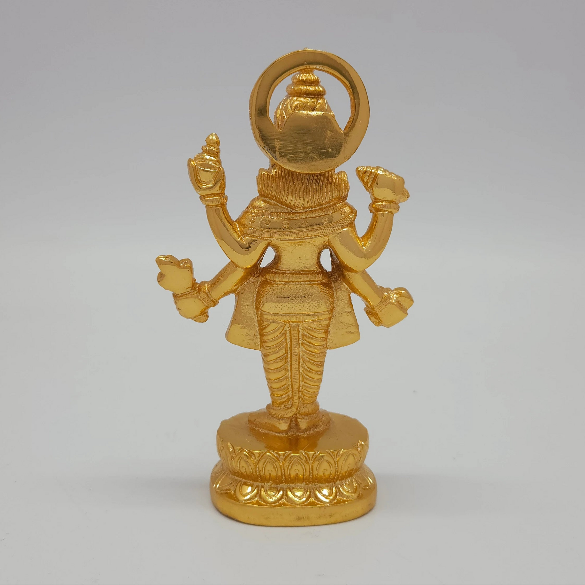 Premium Brass standing Lord Dhanvantari statue 6 inch 15cm back view showing reverse of the shoulders and sirachakra halo disc