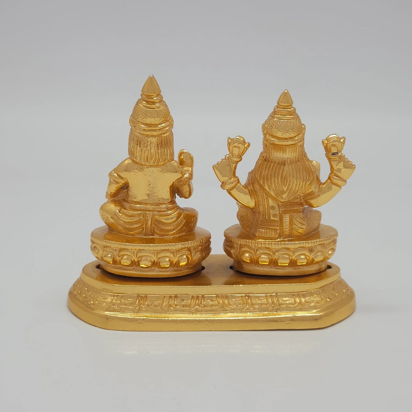 Rear view showcasing the solid back structure of the crowns, the individual lotus base backings, and the flawless mirror-gold luster of the 710g sculpture.