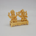 Right 45-degree perspective highlighting Lord Ganesha's trunk contour, the weapon detailing, and the polished metal side boundaries.