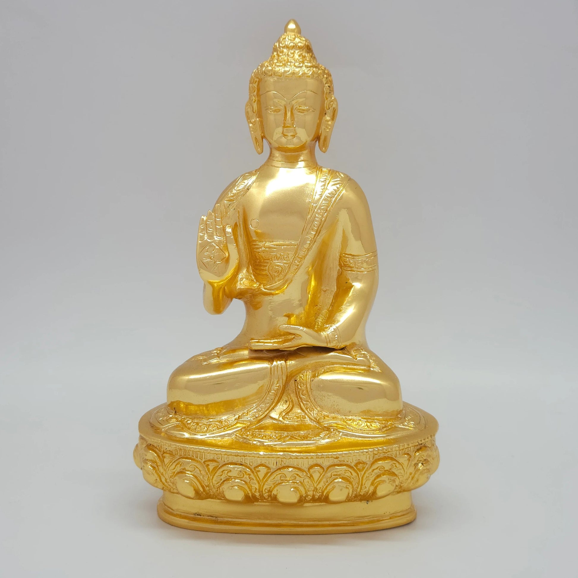 Front view of the 26cm premium gold powder-coated hollow brass meditating Buddha statue by Sri Swaminathan & Co