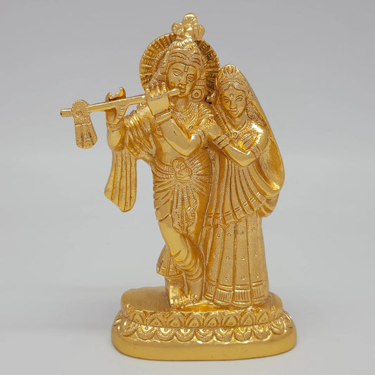 Front view of the 15cm premium gold powder-coated brass Radha Krishna eternal love showpiece on a lotus base for wedding gifting.