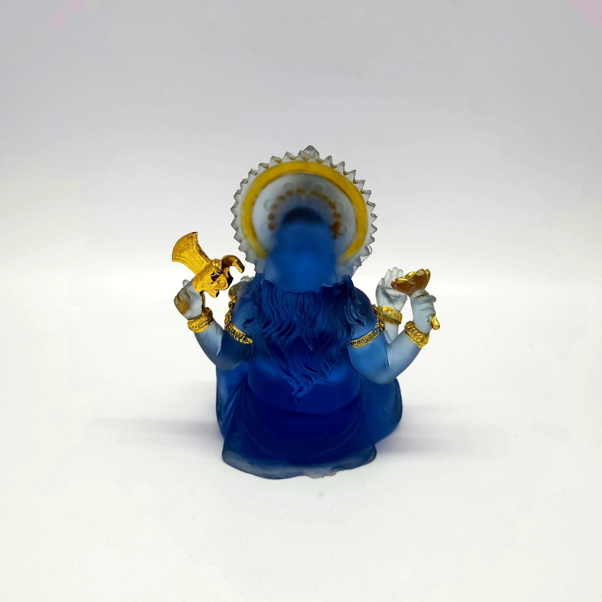 Full back view look of the premium resin frosted blue Ganesha idol showing the circular halo piece.