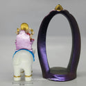 Full back view look of the Ganesha on white elephant sculpture separated away from the purple frame