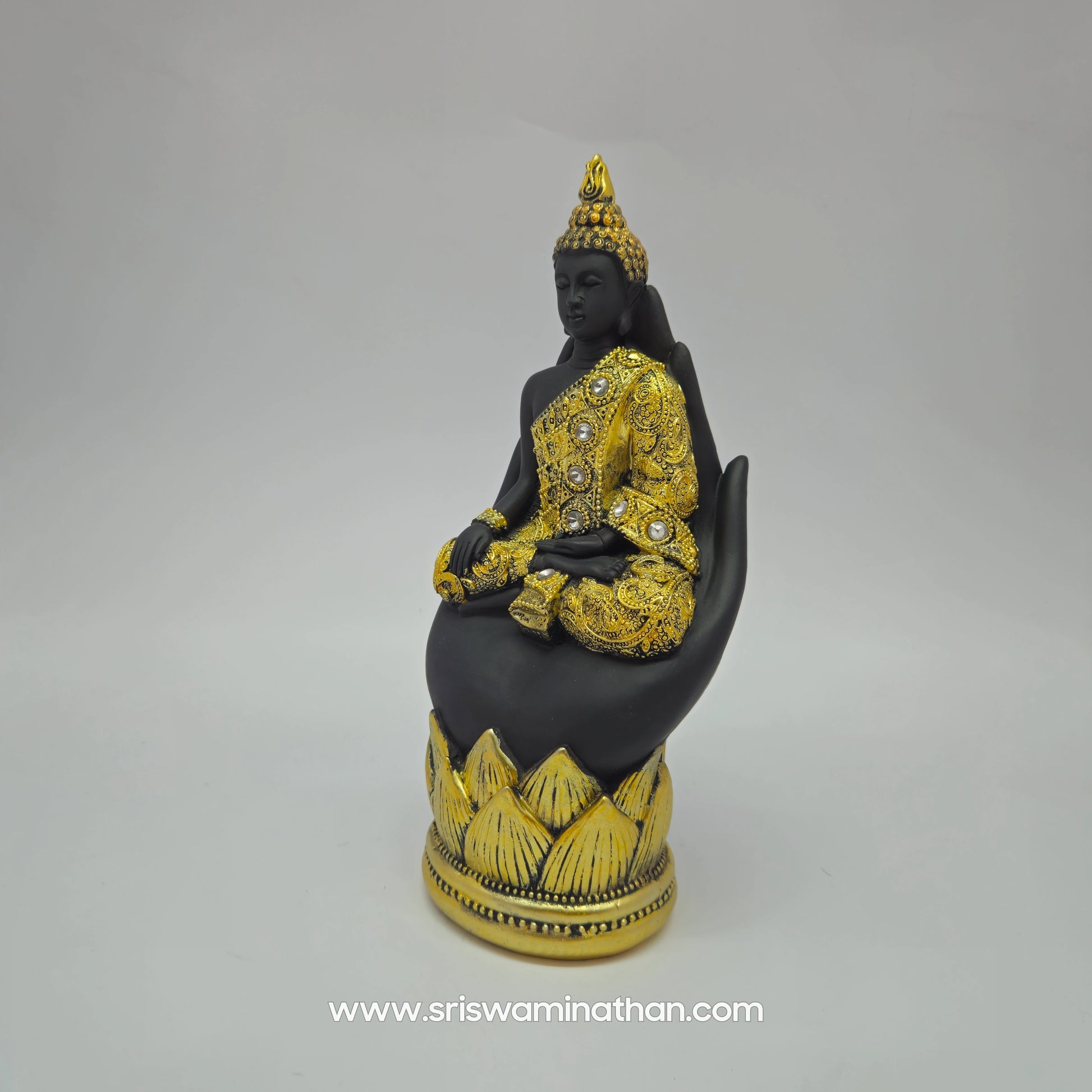 Premium Resin meditating Buddha statue on hand 23cm height 45 degree left pose corner view highlighting dhyana mudra and golden robe stone work