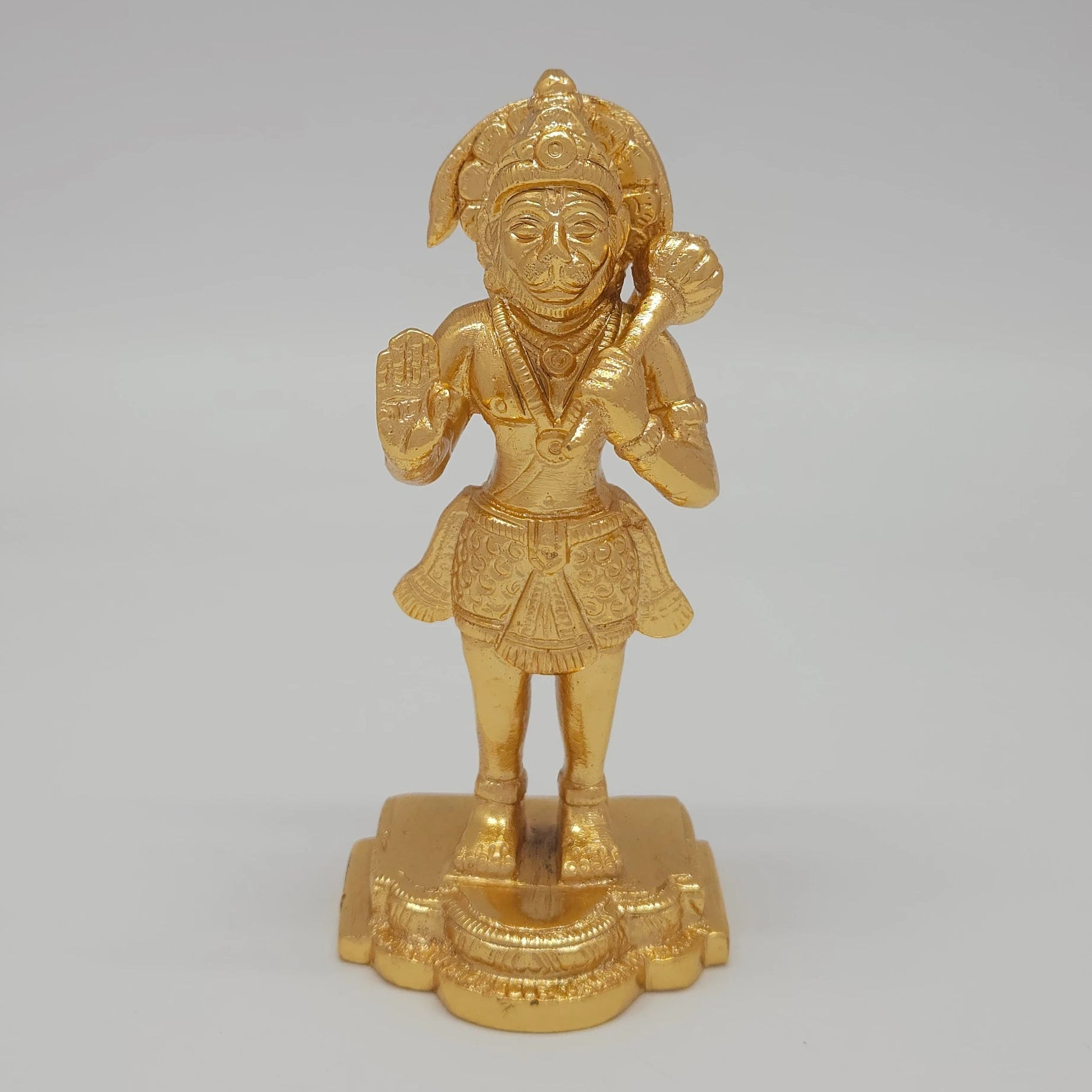 Front view of the 13cm premium gold powder-coated brass Veer Hanuman showpiece with gada over shoulder for office desk decoration.