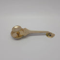 Front perspective view of the solid brass camphor aarti spoon focusing on the round cup shape and the smooth metallic golden finish.