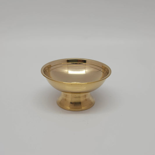  Front view of a single solid brass multipurpose offering cup highlighting the wide flared rim and reflective golden gloss finish