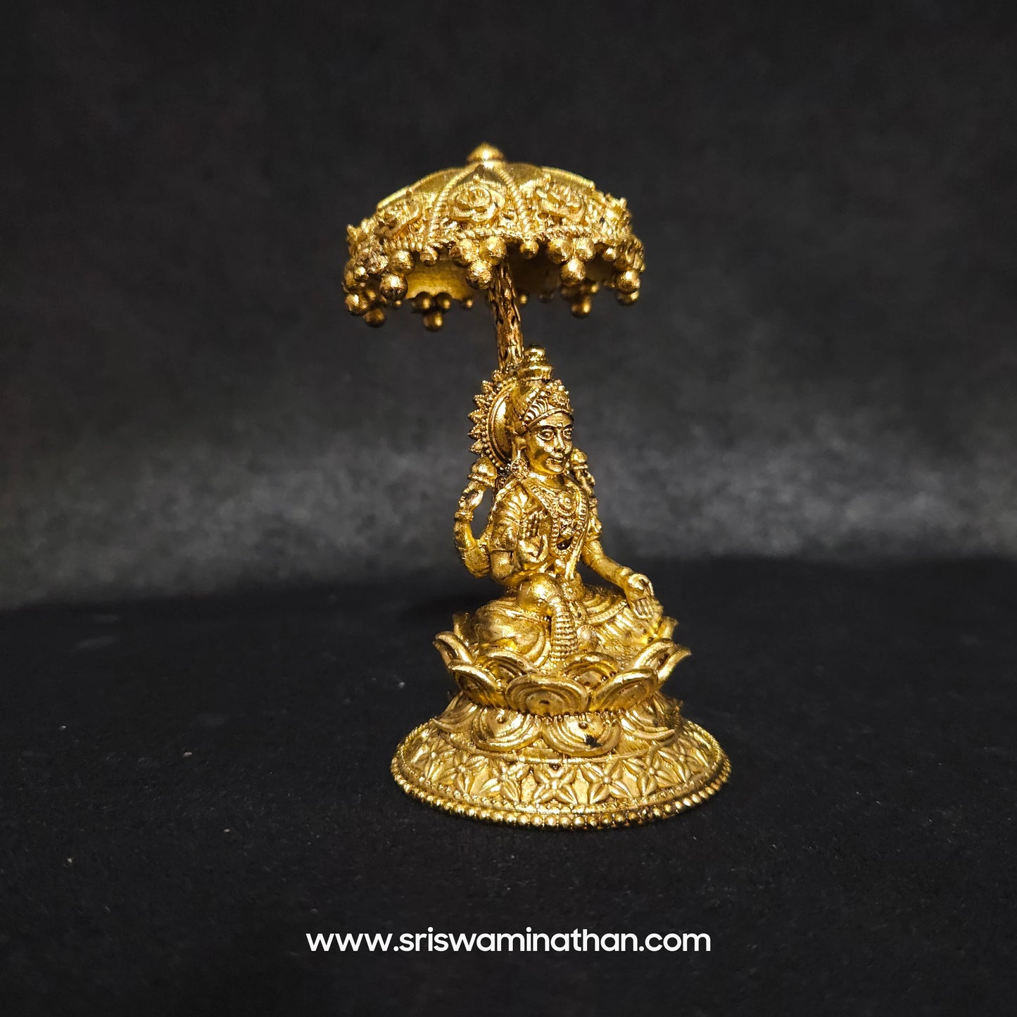 Lakshmi seated Under Umbrella Dome