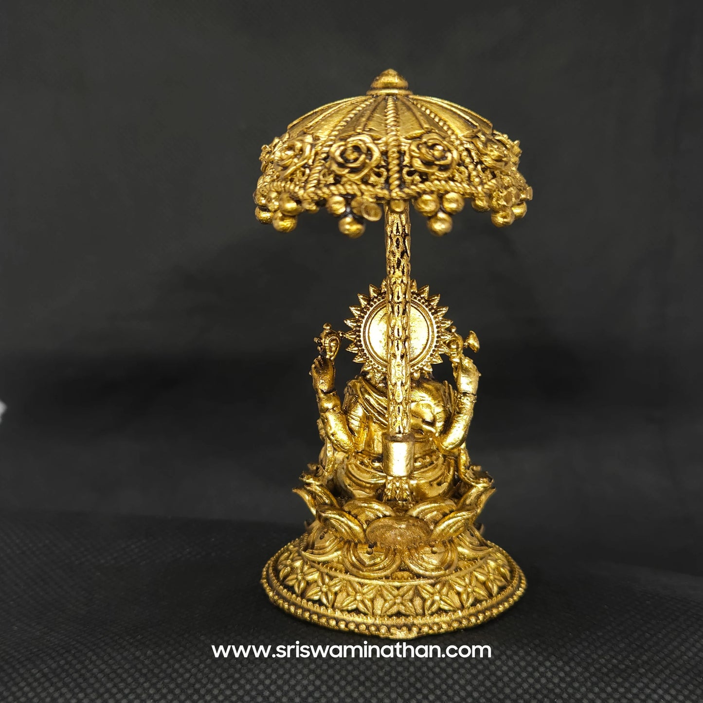 Ganesha seated Under Umbrella Dome