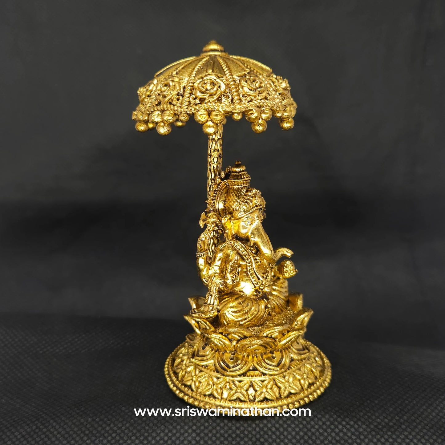 Ganesha seated Under Umbrella Dome