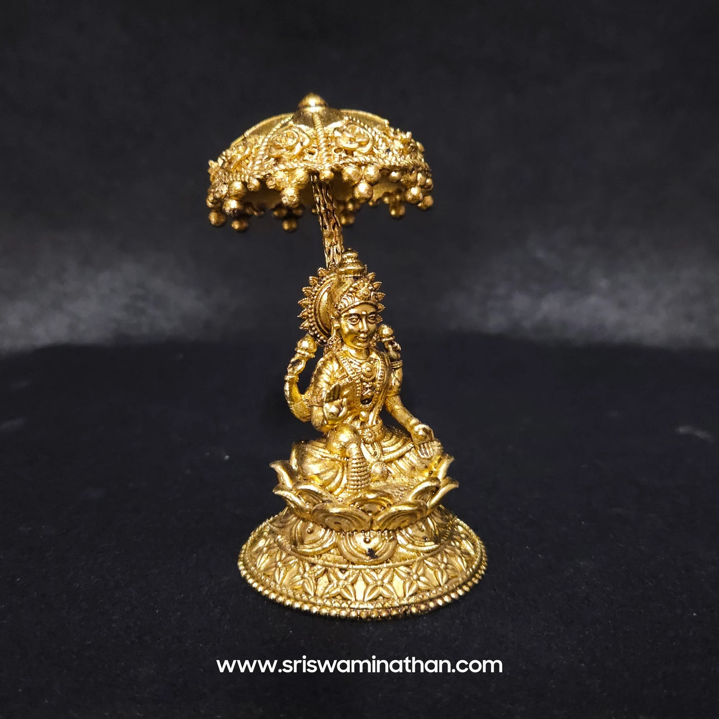 Lakshmi seated Under Umbrella Dome