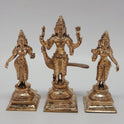 A close up frontal photograph of the Swamimalai Panchaloha Murugan trio emphasizing the traditional casting work on the crowns and garments.