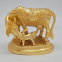 Front view of the 11cm premium gold powder-coated solid brass Kamadhenu cow and calf statue showing the nursing posture and Lakshmi engraving.