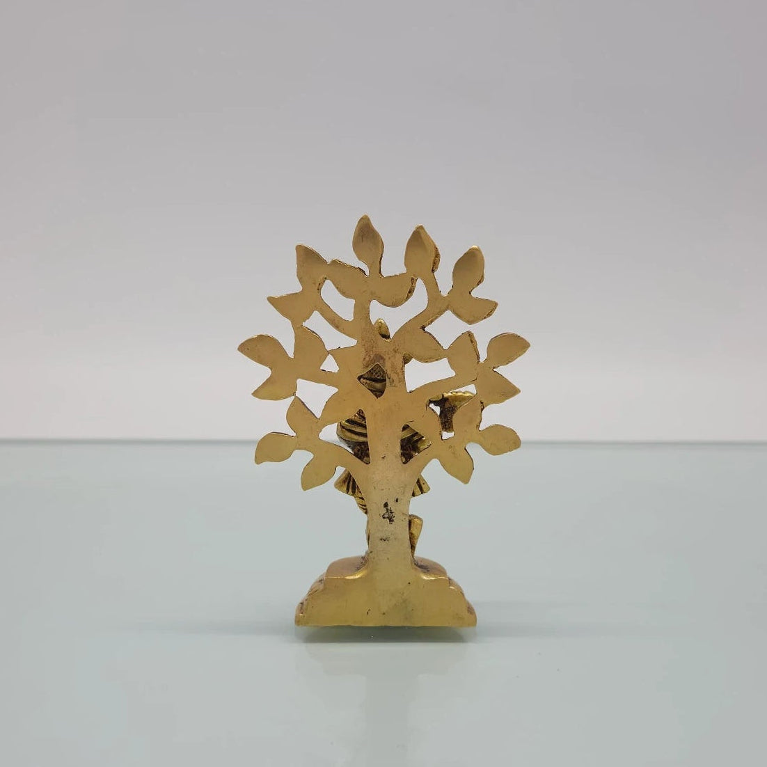 Rear view showcasing the solid back structure of the branch network, the reverse circular lotus base, and the raw antique brass texture of the 160g idol.