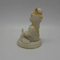 Full back view of the 5-inch baby Krishna statue demonstrating the clean contours of his hair bun and the rounded edges of the base platform.