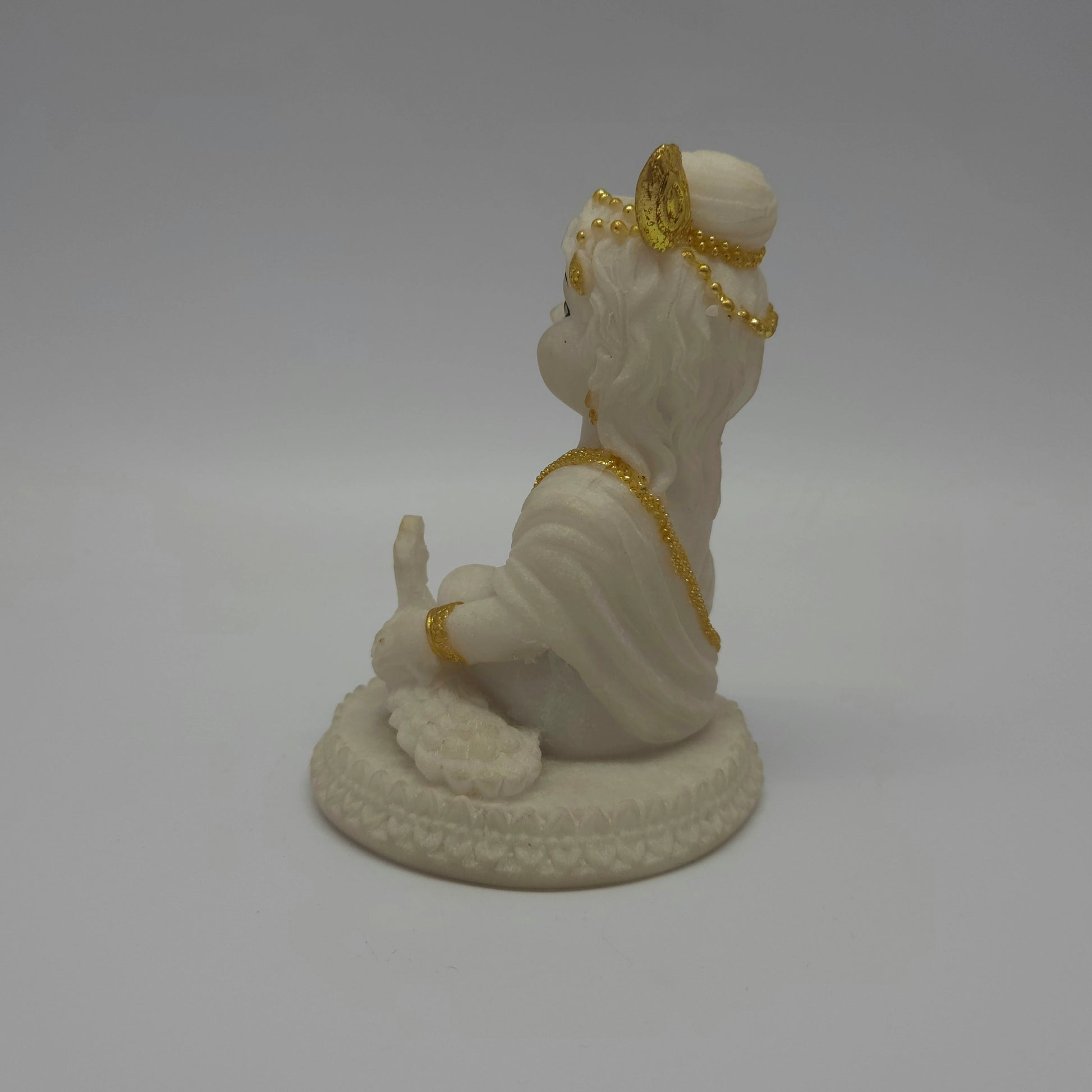 Full back view of the 5-inch baby Krishna statue demonstrating the clean contours of his hair bun and the rounded edges of the base platform.