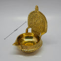 Three-quarter front right perspective view of the brass Ashtalakshmi deepam highlighting the deep 150ml capacity basin with depth measurement marker.