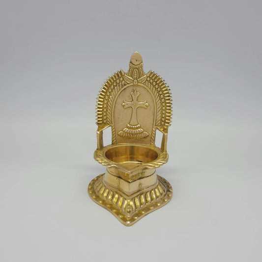 Straight front view of the 14cm traditional brass Christian Cross altar vilakku showcasing the high gloss mirror polish by Sri Swaminathan and Co.