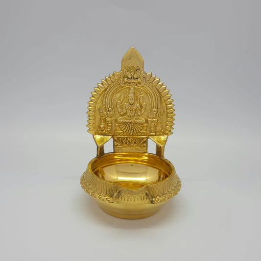 Straight front view of the 15cm brass Karumbu Kamatchi Kubera Nalla Vilakku showcasing the detailed seating posture and high-gloss polish by Sri Swaminathan and Co.