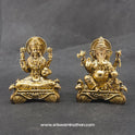 Front perspective view showcasing a paired set of the brass seated Lakshmi statue alongside a matching seated Ganesha idol on a matching hamsa throne base.