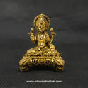 Straight front profile view of the 5cm premium brass Lakshmi statue on a floral elephant head pedestal featuring an easy-to-clean low maintenance golden finish by Sri Swaminathan and Co.