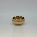 Straight front view of a single solid brass lotus border center-wick diya showcasing its scalloped rim design by Sri Swaminathan and Co.