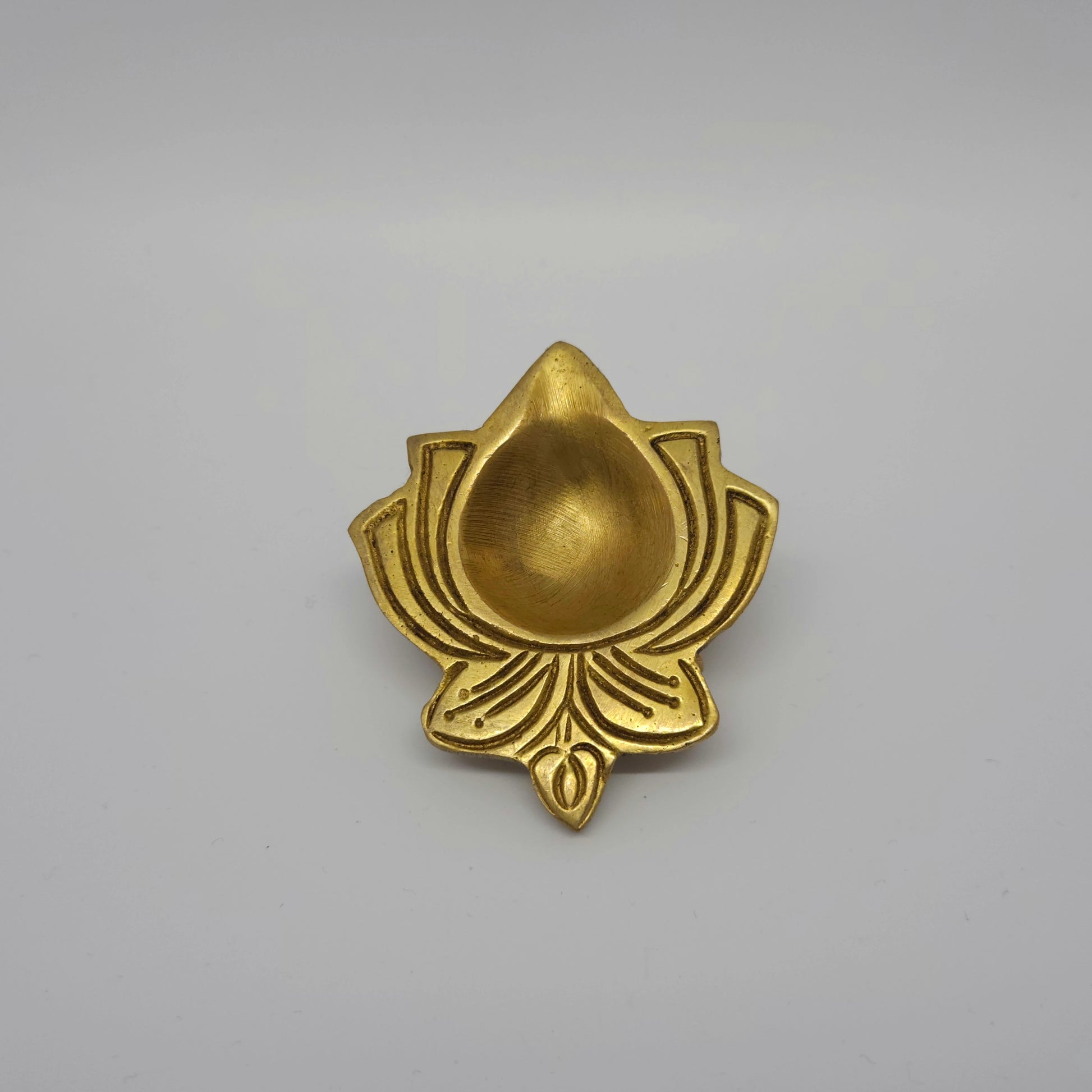 Straight front view of the 8.5cm big size fine grade solid brass lotus shaped pooja diya by Sri Swaminathan and Co.